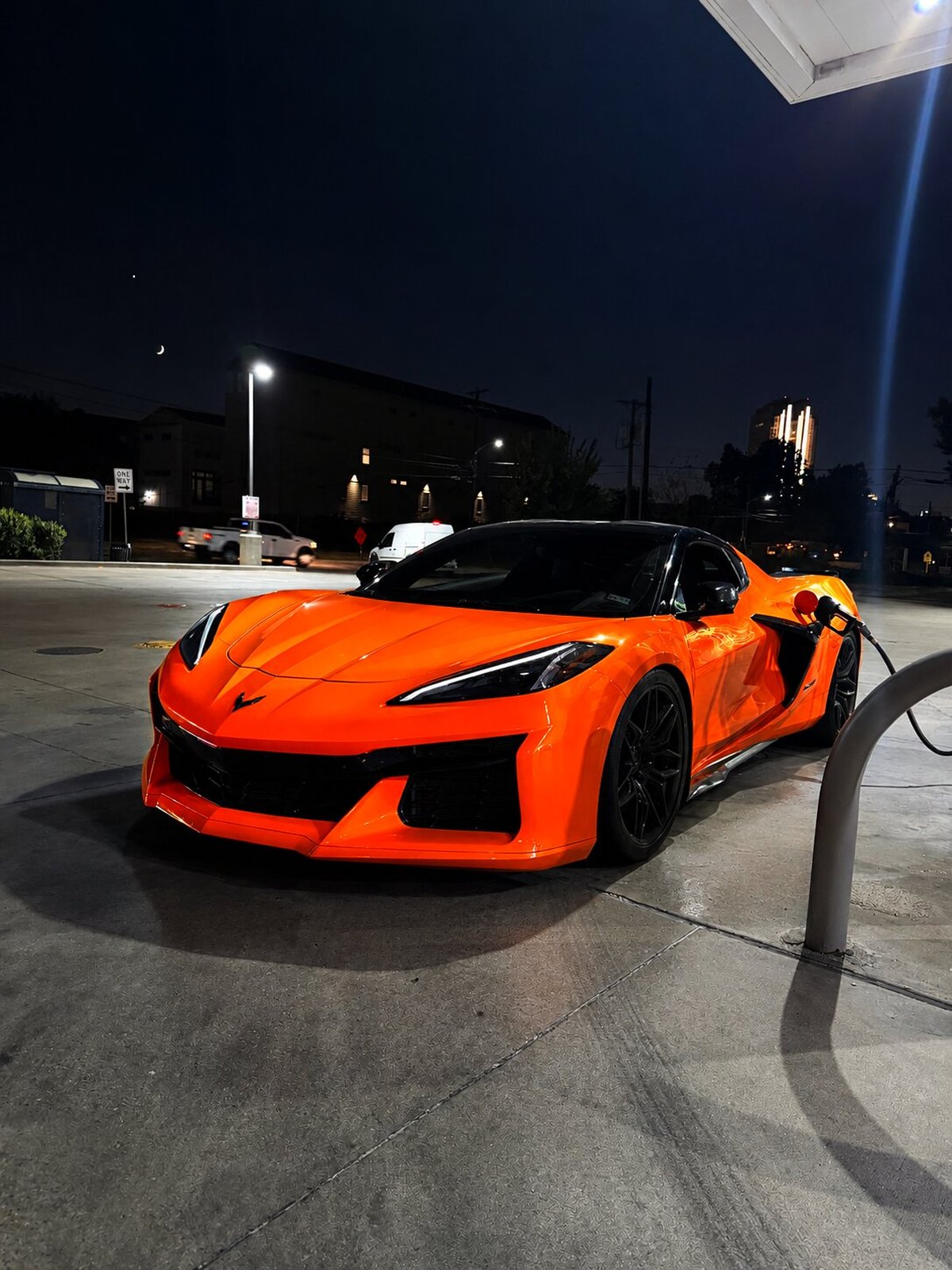 Corvette Z06 2LZ sports car rental parked at night in Dallas–Fort Worth