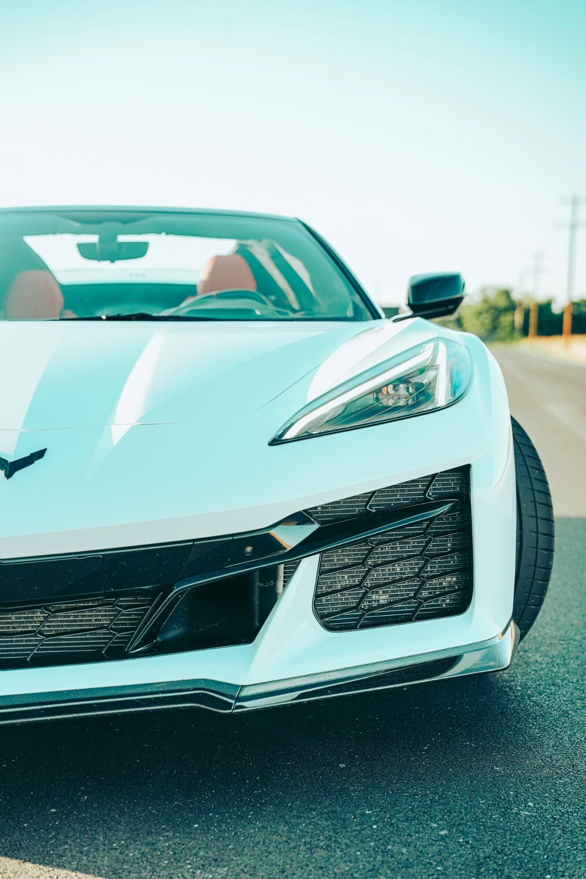 Corvette Z06 3LT front three-quarter headlight detail in daylight